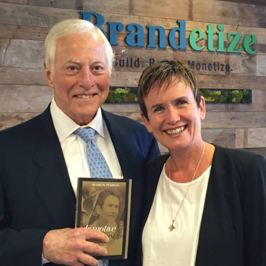 Remi with Brian Tracy